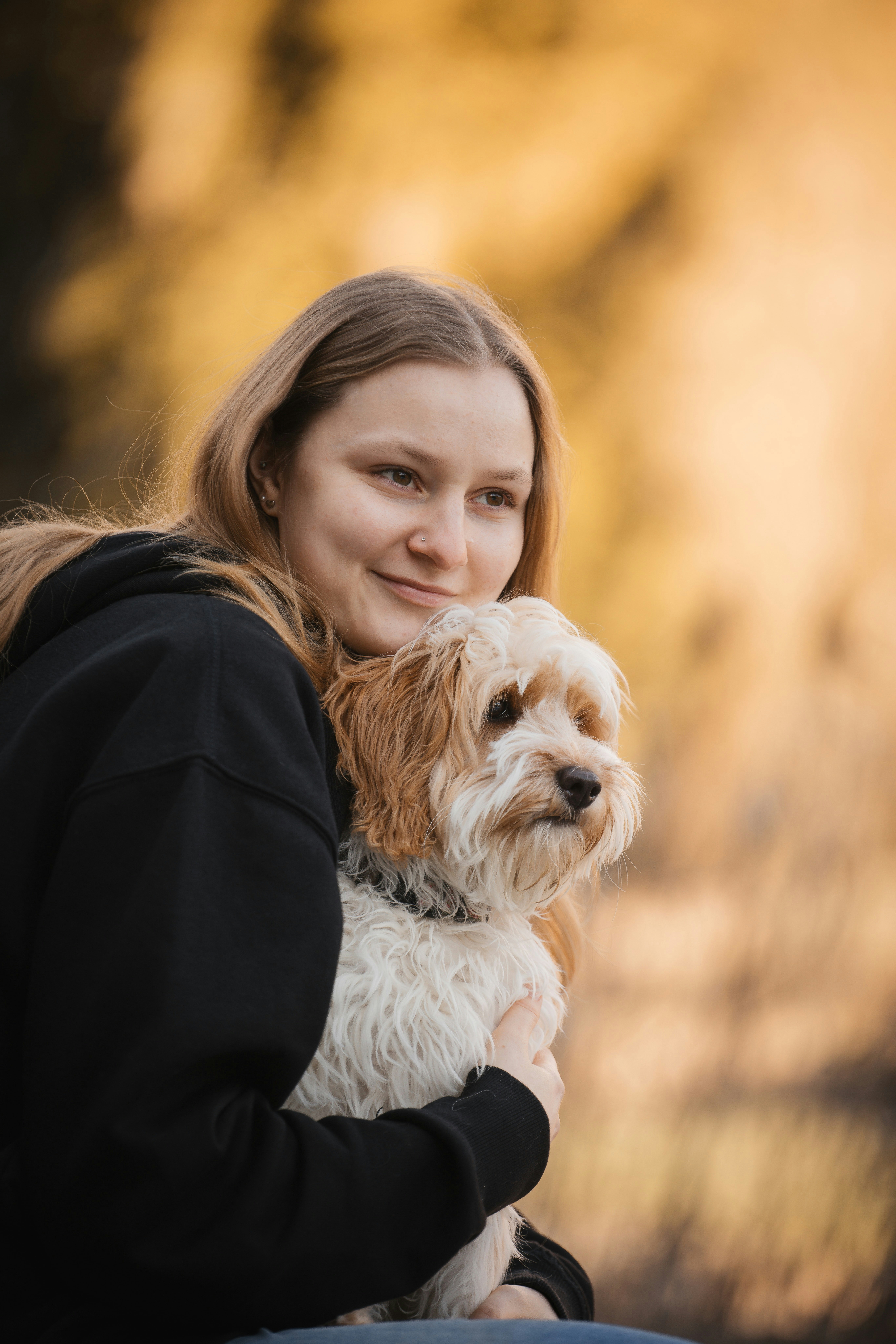 A women and a dog.
